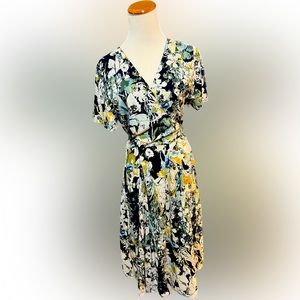 Floral pattern, short sleeve wrap dress, size large, below the knee length.